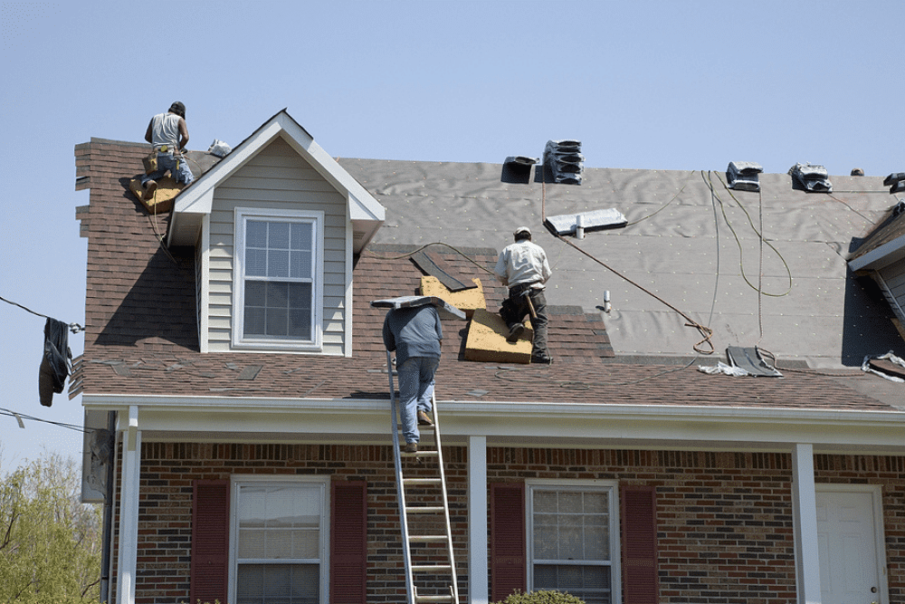 best roofing materials, roofing and construction expert in Hammond, LA at Pride Roofing LLC. Professional roofers installing new shingles on a residential home roof.